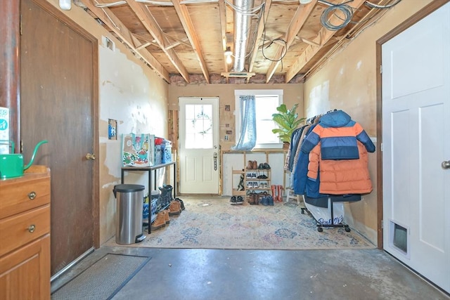 entrance foyer featuring concrete flooring