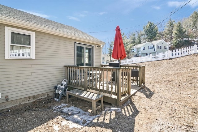 wooden deck featuring fence