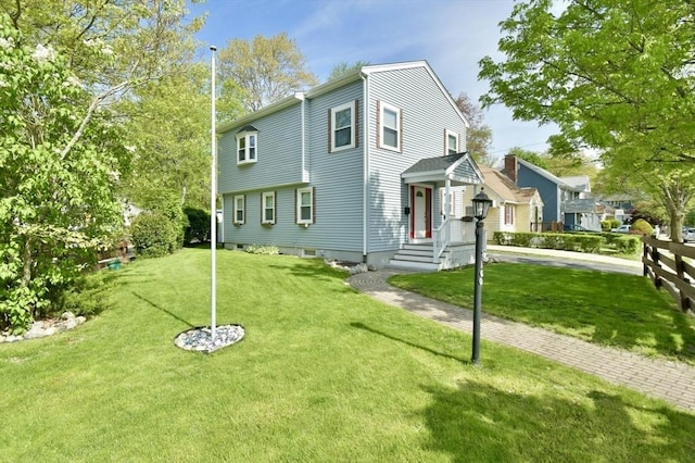 view of front of property with a front yard