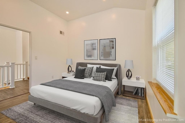 bedroom featuring wood finished floors