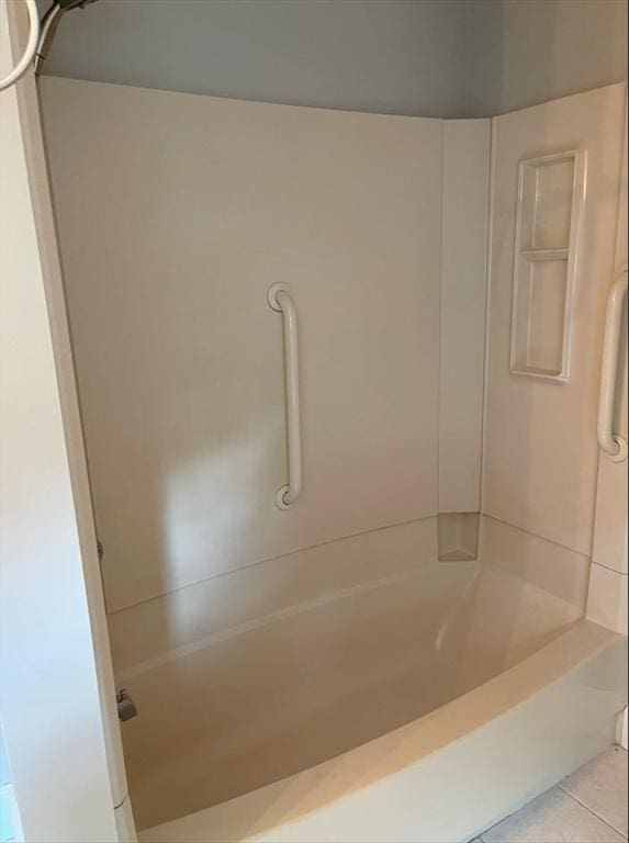 39 Barnard Rd, Worcester, MA 01605 - bathroom with tub / shower combination and tile patterned floors