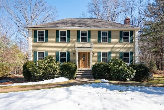 colonial home with a chimney