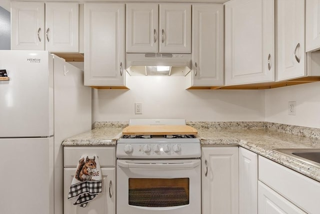 18 Doyle St, Lawrence, MA 01841 - kitchen with white appliances, under cabinet range hood, and white cabinets