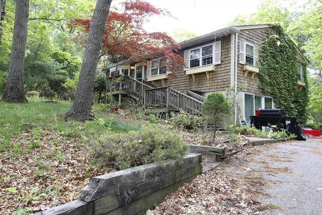 708 Berkley St, Berkley, MA 02779 - view of side of home featuring stairway and driveway