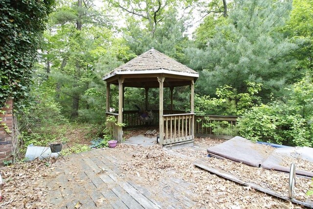 708 Berkley St, Berkley, MA 02779 - wooden deck featuring a gazebo and a view of trees