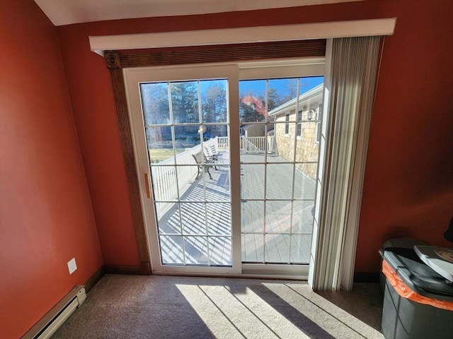 entryway with dark colored carpet and a baseboard radiator