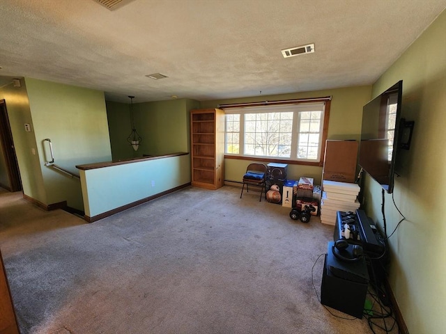 interior space featuring a textured ceiling