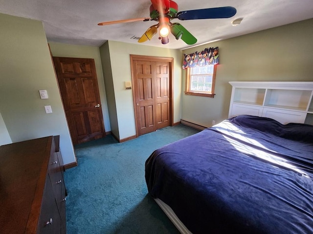 carpeted bedroom featuring ceiling fan, baseboard heating, and a closet