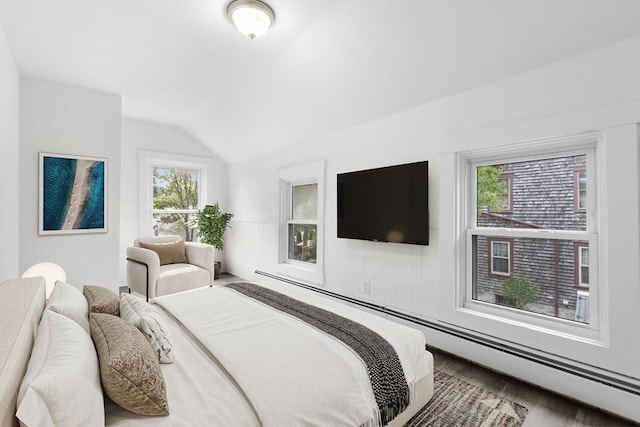 123 Ash St, New Bedford, MA 02740 - bedroom with vaulted ceiling, wood finished floors, and baseboard heating
