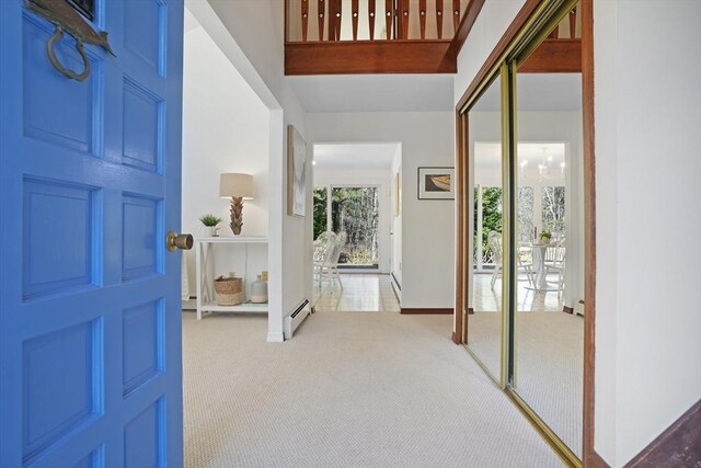 3 Down Harbor Rd, Edgartown, MA 02539 - carpeted entrance foyer featuring a baseboard heating unit