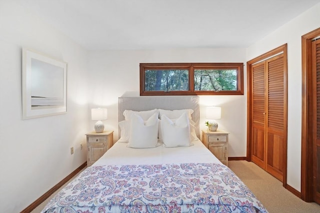 3 Down Harbor Rd, Edgartown, MA 02539 - bedroom with baseboards, light carpet, and multiple closets