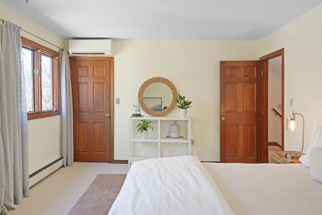 3 Down Harbor Rd, Edgartown, MA 02539 - carpeted bedroom with a wall mounted air conditioner and a baseboard radiator