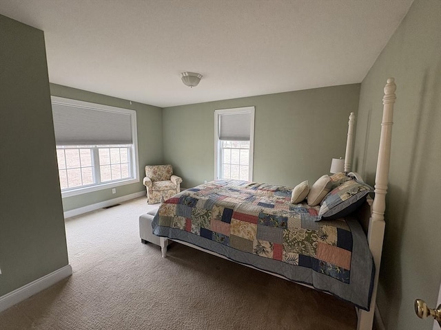 bedroom featuring carpet