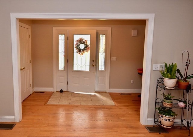 entrance foyer featuring light hardwood / wood-style flooring