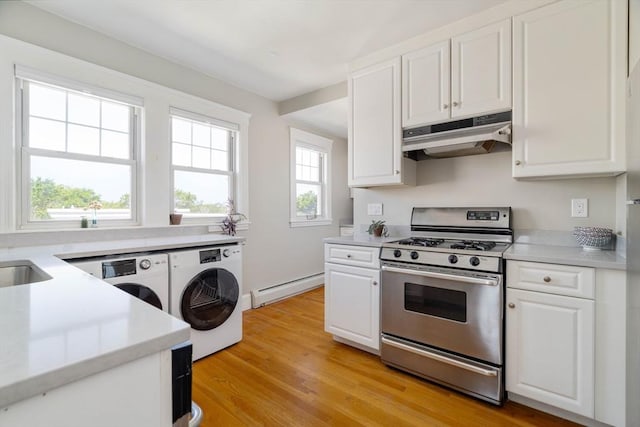 42 Lourdes Ave Unit 3, Boston, MA 02130 - kitchen featuring stainless steel range with gas stovetop, a baseboard radiator, under cabinet range hood, and white cabinetry