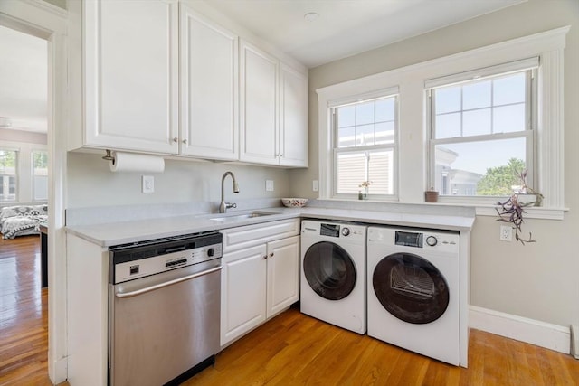 42 Lourdes Ave Unit 3, Boston, MA 02130 - laundry area with separate washer and dryer, light wood finished floors, and healthy amount of natural light