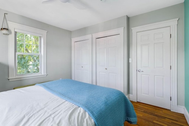42 Lourdes Ave Unit 3, Boston, MA 02130 - bedroom with two closets, dark wood finished floors, and a ceiling fan