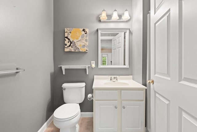 190 Chickering Rd Unit 201D, North Andover, MA 01845 - bathroom with vanity, toilet, and baseboards
