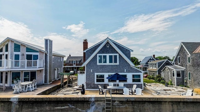 36 Ocean St, Marshfield, MA 02050 - rear view of property with a patio, a balcony, and outdoor dining area