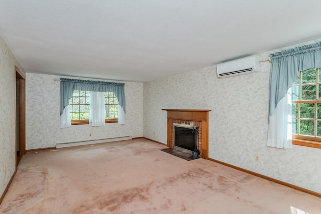 unfurnished living room with a baseboard radiator, a wall unit AC, a fireplace, and wallpapered walls