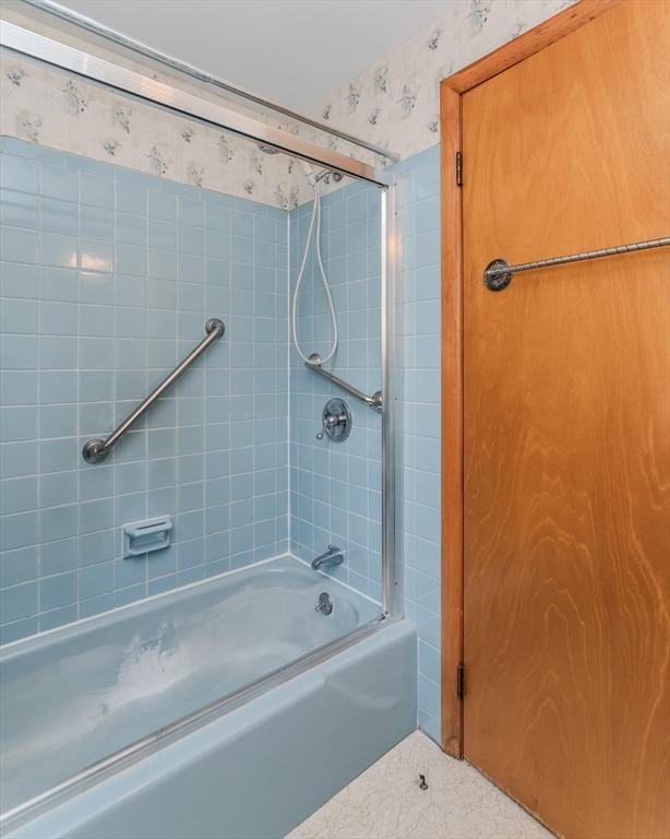 full bath with shower / tub combination, tile patterned flooring, and wallpapered walls