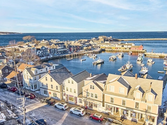 birds eye view of property featuring a residential view and a water view