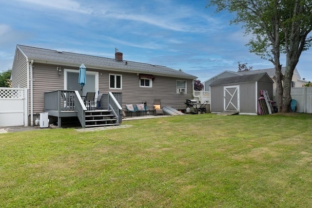 11 Ann Ave, Dartmouth, MA 02747 - rear view of property featuring a deck, a storage shed, and a chimney
