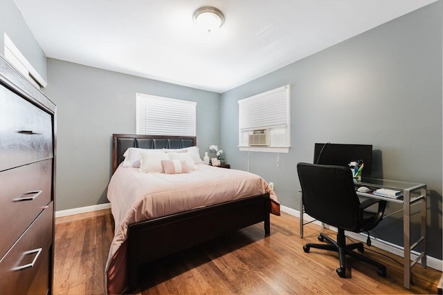 11 Ann Ave, Dartmouth, MA 02747 - bedroom with wood finished floors, a desk, and cooling unit