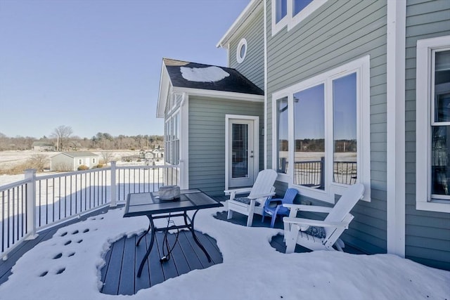 view of snow covered deck