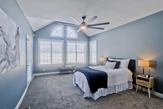 bedroom with carpet floors, baseboards, a ceiling fan, and lofted ceiling