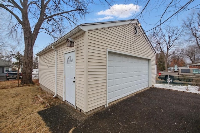 detached garage with fence