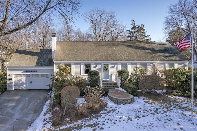 ranch-style home with a garage