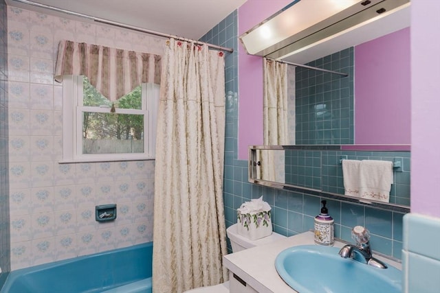 full bathroom with toilet, tasteful backsplash, tile walls, vanity, and shower / bath combination with curtain