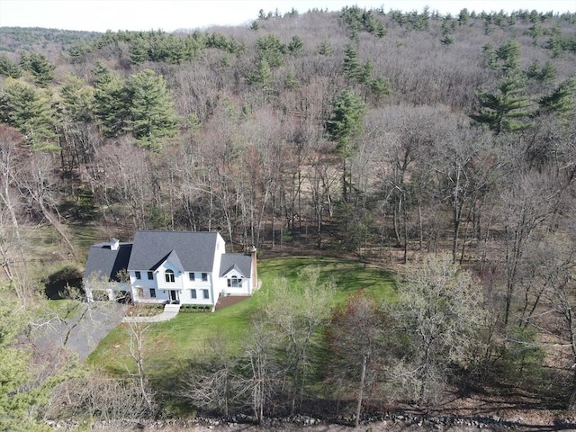 aerial view featuring a view of trees