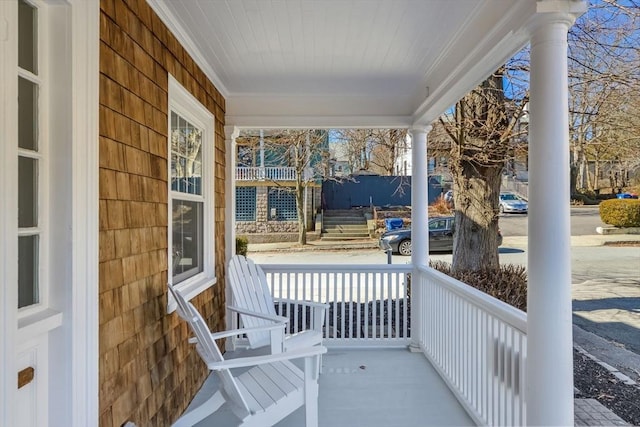 balcony featuring a porch