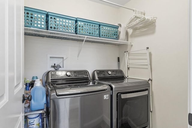 laundry area featuring laundry area and washer and dryer