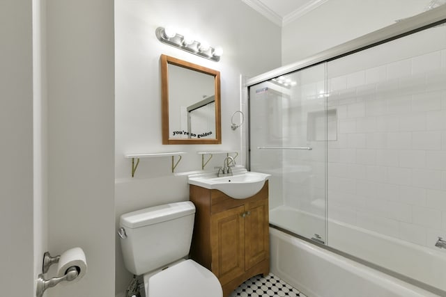 full bathroom featuring vanity, enclosed tub / shower combo, crown molding, toilet, and tile patterned floors