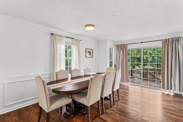 69 Kame St, Brockton, MA 02302 - dining room featuring ornamental molding, a wainscoted wall, wood finished floors, and a decorative wall