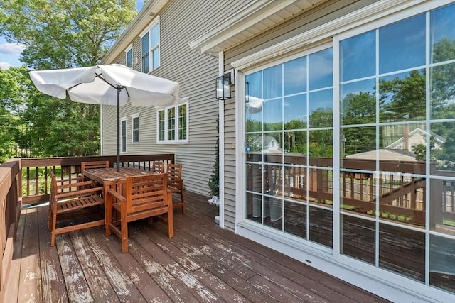 69 Kame St, Brockton, MA 02302 - wooden deck with outdoor dining area