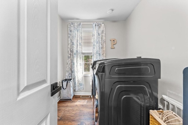 69 Kame St, Brockton, MA 02302 - laundry room with dark wood-style floors and washer / dryer
