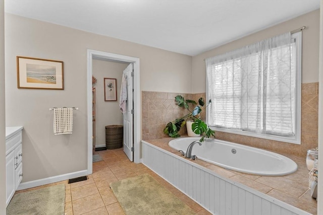 69 Kame St, Brockton, MA 02302 - bathroom featuring vanity, a garden tub, and tile patterned floors