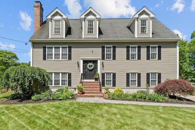 69 Kame St, Brockton, MA 02302 - view of front of property featuring entry steps, a front lawn, a chimney, and a shingled roof