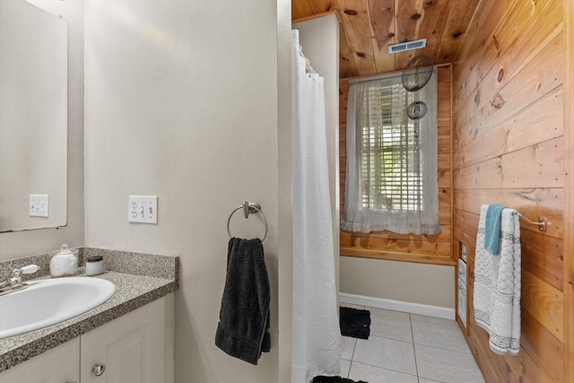 69 Kame St, Brockton, MA 02302 - full bath with wood walls, vanity, tile patterned floors, wooden ceiling, and shower / tub combo with curtain