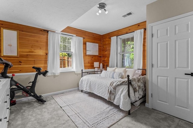 69 Kame St, Brockton, MA 02302 - bedroom with carpet flooring and wood walls
