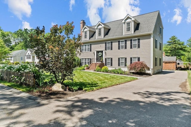 69 Kame St, Brockton, MA 02302 - view of front facade featuring a chimney
