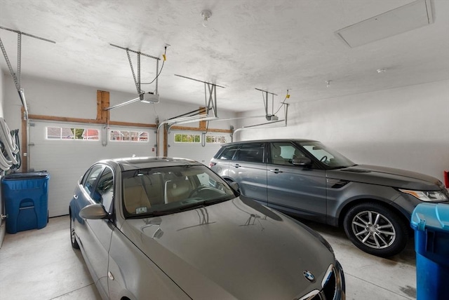 16 Winterberry Way, Plymouth, MA 02360 - garage featuring a garage door opener