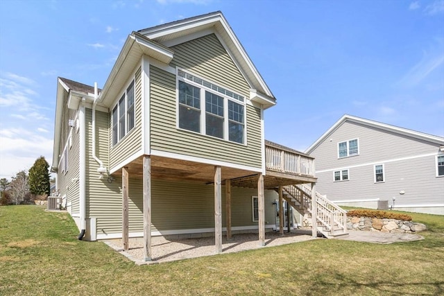 16 Winterberry Way, Plymouth, MA 02360 - back of property featuring a deck, stairs, central AC unit, a patio area, and a lawn