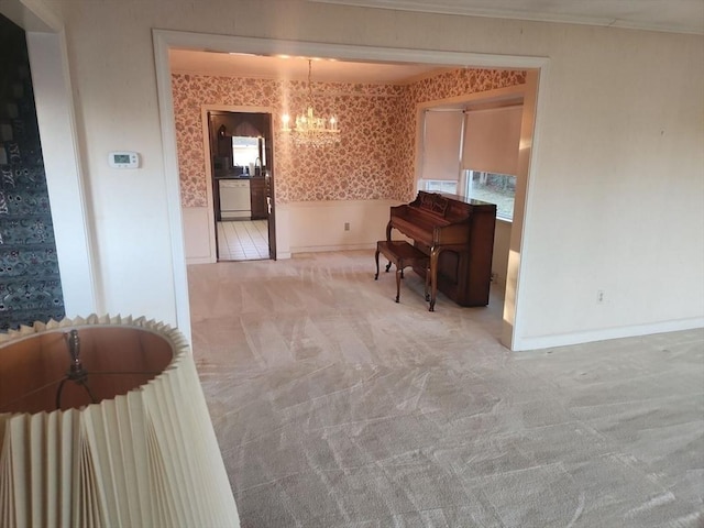 misc room featuring carpet flooring and a chandelier