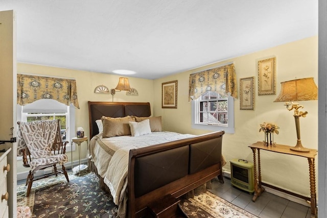bedroom with tile patterned floors