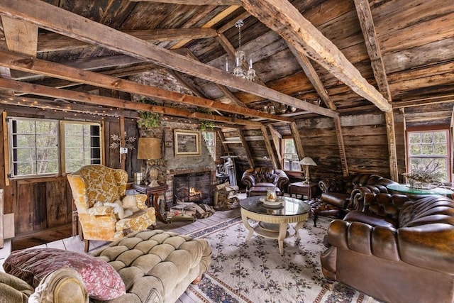 living room with wood walls, wood ceiling, and a stone fireplace